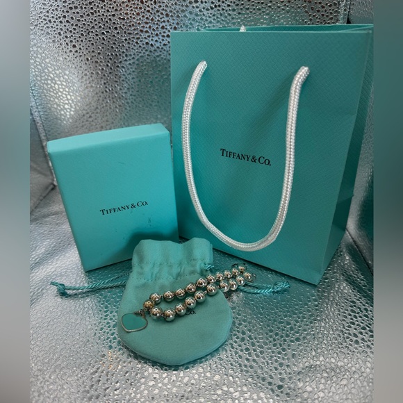 Tiffany & Co. Jewelry - Tiffany & Co. Silver Bead Bracelet with Teal Heart